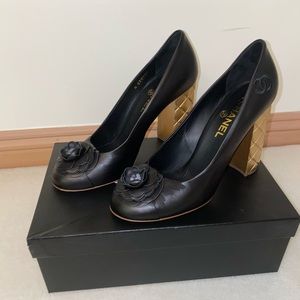 Chanel Black Camellia Leather Pumps